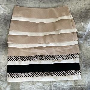 Versatile above knee skirt